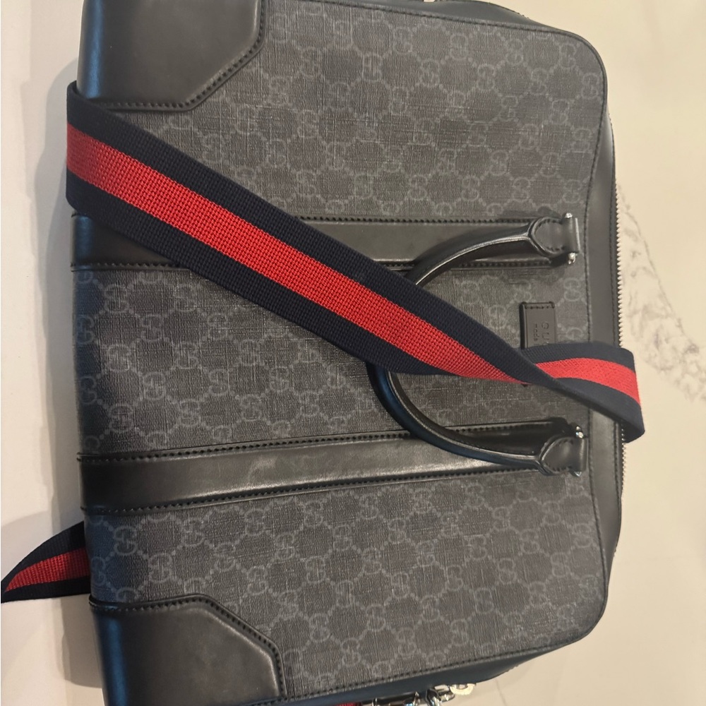 Gucci Messenger/Laptop bag. Only worn three times before I got a backpack